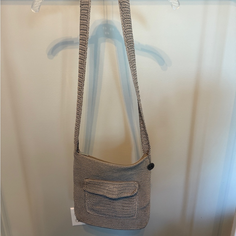 21. The Sak Textured Gray Crossbody Bag